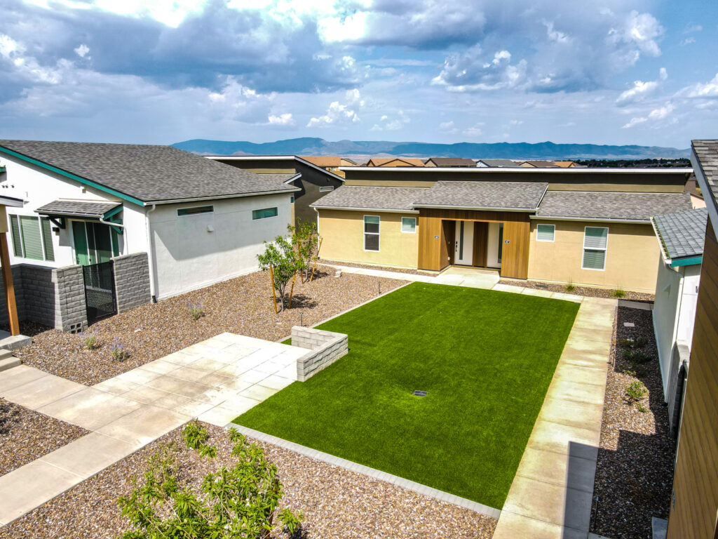 Our team planting a native shade tree for a residential property in Prescott, AZ